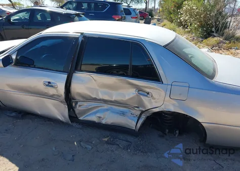 2003 Cadillac Deville Standard z USA, uszkodzony, nr VIN 1G6KD54Y53U277530